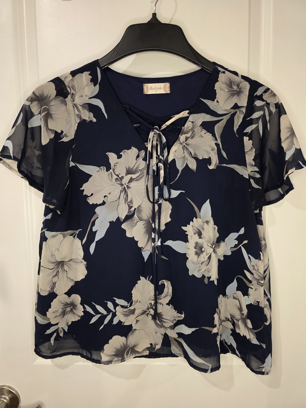 Altar'd State navy floral lace-up blouse